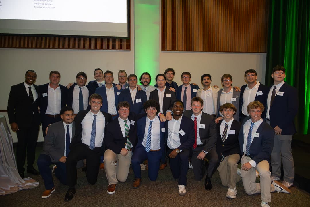 Every Loyola rugby scholarship recipient since the program began, together on stage at McGuire Hall