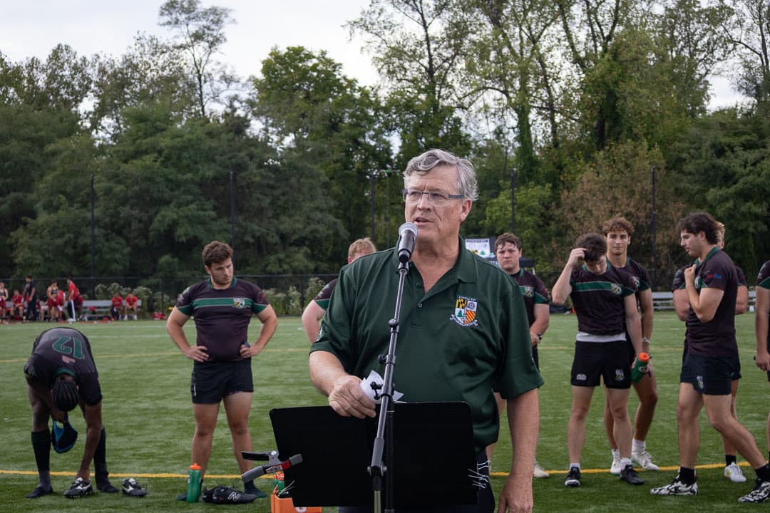 Tim Madey '84 speaking at the Loc Vetter memorial on Lugano Field